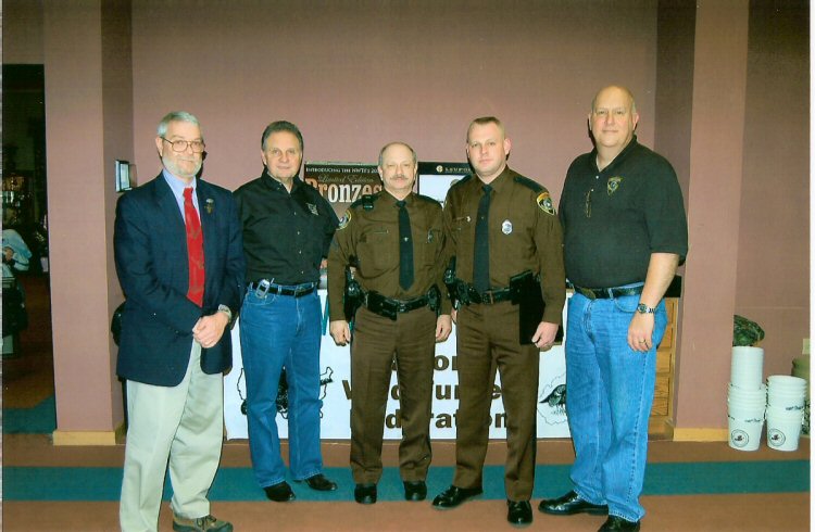 Wildlife Resources Section Chief Curtis Taylor, DNR Director Frank Jezioro, Cpl. Gary Amick, Conservation Officer Warren Goodson, and Capt. Stephan Stewart